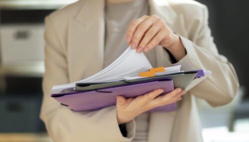 young-adult-organizing-documents-scaled-e1740742950302-1-1-1-1.jpg - Vyra Shine | One-Stop Business Services for Startups & SMEs Corporate Secretarial Services